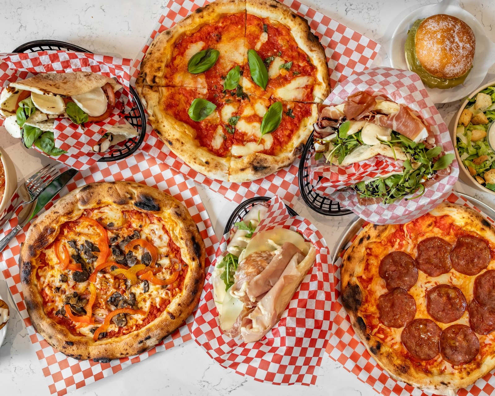 Angry Paesano in Griffintown offers authentic Neapolitan-style pizzas, Italian street food, and handmade frozen pizzas. Fresh ingredients, cozy vibe, and unique flavors. 